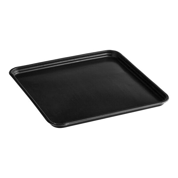 A black TurboChef solid Teflon basket with a handle.