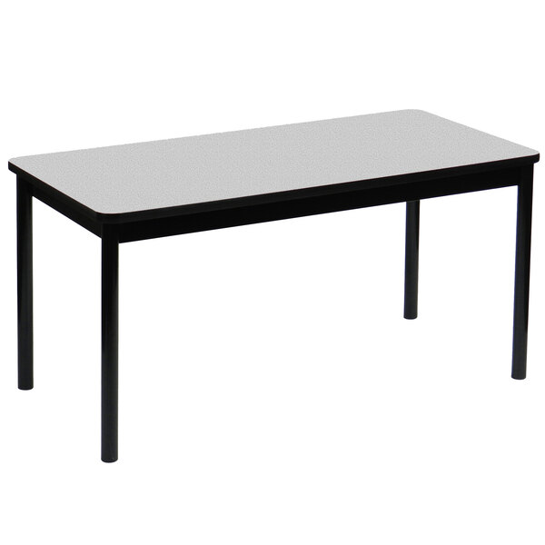 A Correll gray granite lab table with black legs.