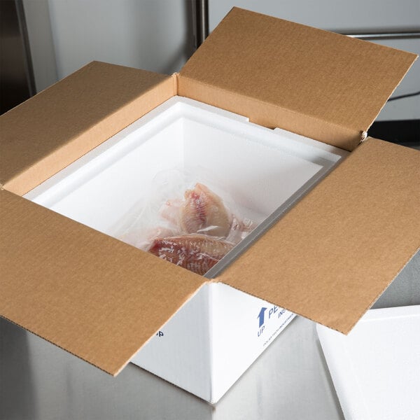 A Polar Tech insulated shipping box with food inside.