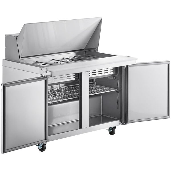 An Avantco stainless steel 2 door refrigerator with a lid open.