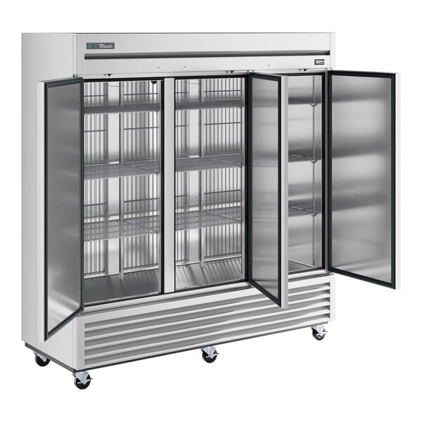 A True stainless steel reach-in freezer with solid doors.