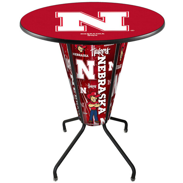 A round bar table with the University of Nebraska Cornhuskers logo on it.