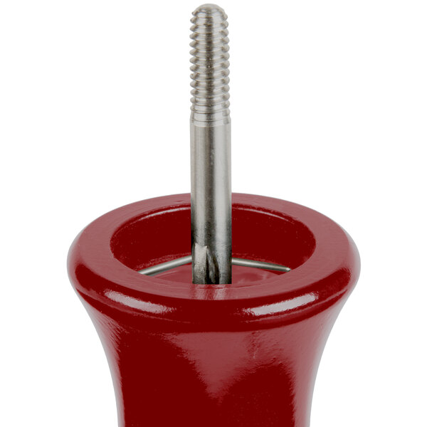 A close-up of a red Fletchers' Mill Marsala pepper mill with a screw in a red holder.