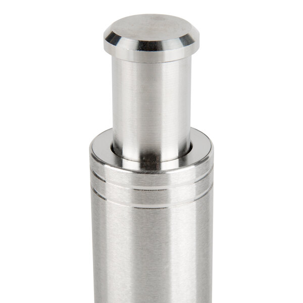 A stainless steel and acrylic salt mill with a metal cap and cylinder.