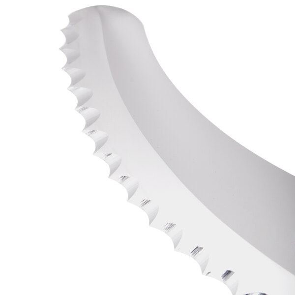 A close-up of a white serrated blade with teeth.