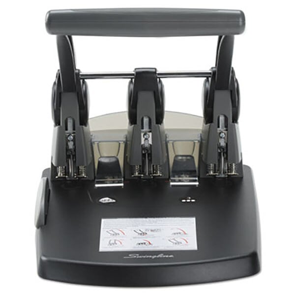 A black and grey Swingline 3 hole punch.