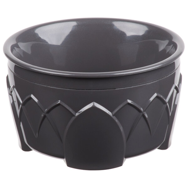 A graphite grey Dinex insulated bowl with a carved design.