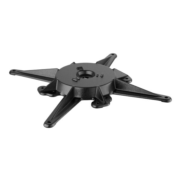 A black cast iron table base spider with a hole in the center.