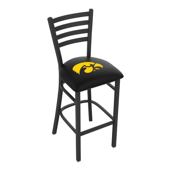 A black steel bar height chair with a ladder back and a padded seat featuring the University of Iowa logo.