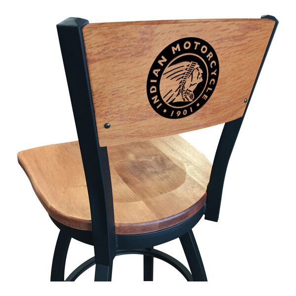 A black steel bar stool with a maple back and seat and an Indian Motorcycle logo laser engraved in white.