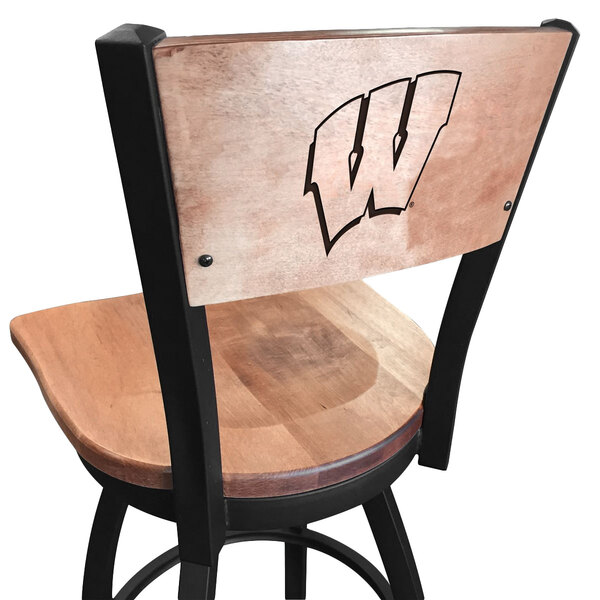 A black steel bar height swivel chair with a University of Wisconsin logo on the maple back and seat.