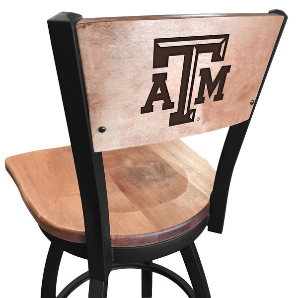 A black steel bar stool with a Texas A&M logo on the maple back and seat.