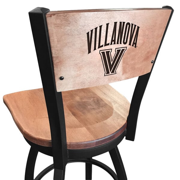 A black steel Holland Bar Stool with Villanova logo laser engraved on the maple wood seat and back.