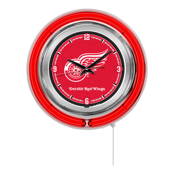 A white and red clock with a silver frame and the Detroit Red Wings logo.