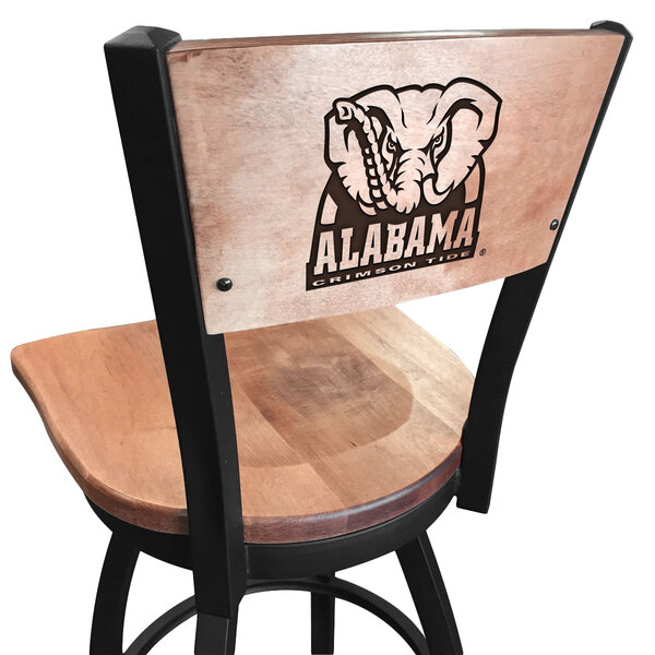 A black steel bar height chair with a maple back and seat and a University of Alabama logo laser engraved on the back.