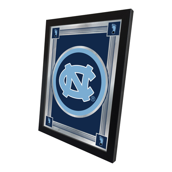 A framed decorative mirror featuring the University of North Carolina logo and colors.