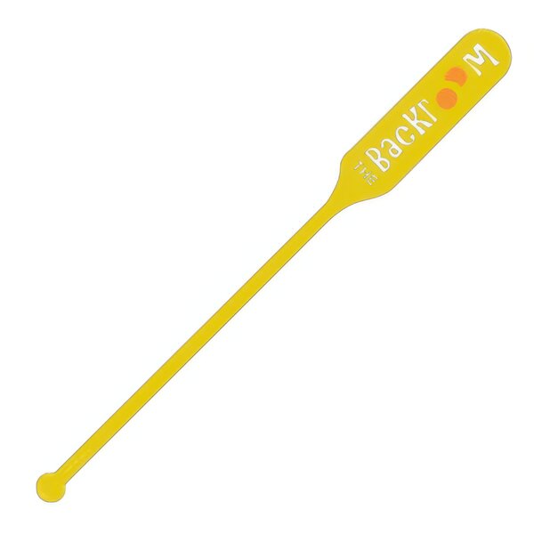 A yellow plastic WNA Comet paddle stirrer with white text.