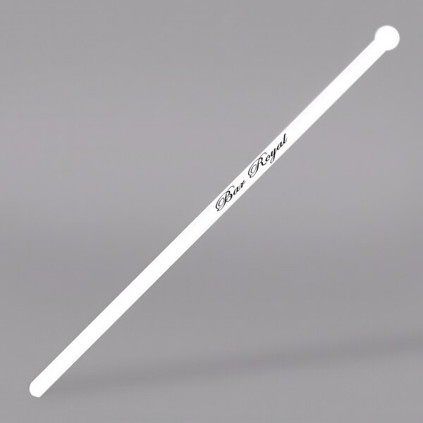 A white WNA Comet Slim Jim flat stirrer with black text.
