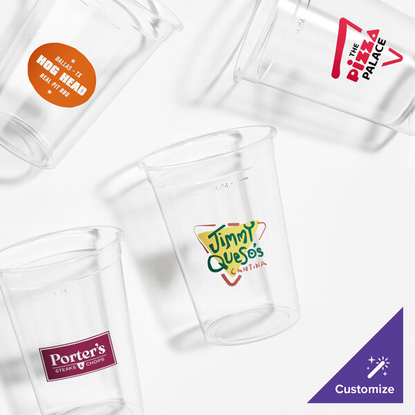 A group of empty Fabri-Kal clear plastic cups.