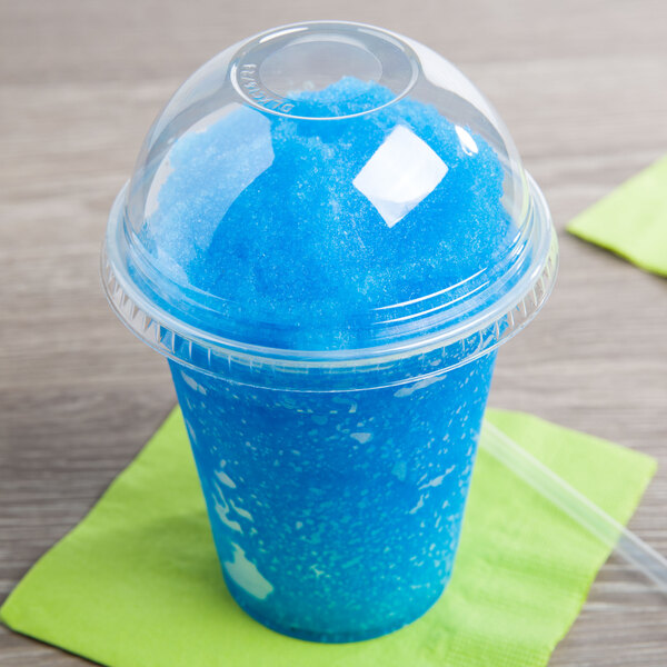 a blue slushy in a plastic cup
