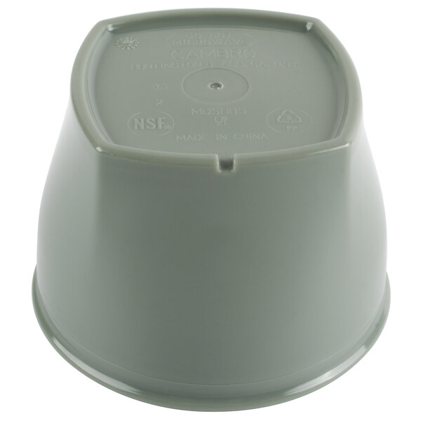 A grey plastic bowl with a white plastic lid with a hole in it.