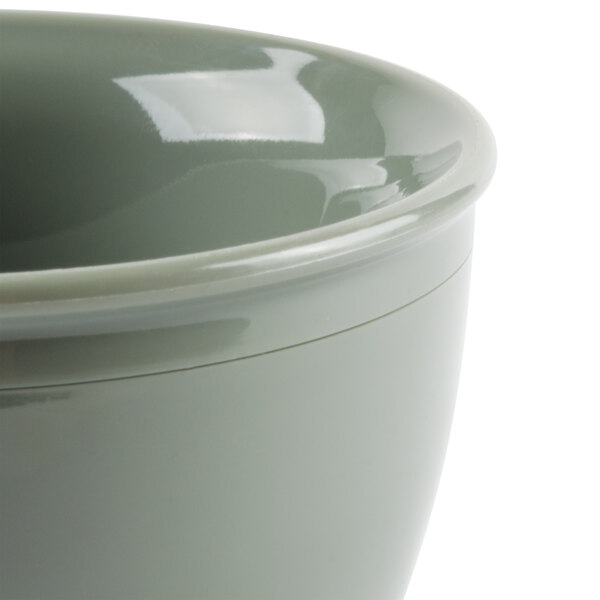 A close-up of a grey Cambro insulated plastic bowl with a white rim.