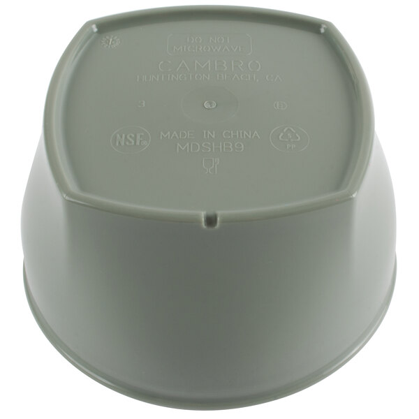 A grey plastic bowl with text on it and a white lid.