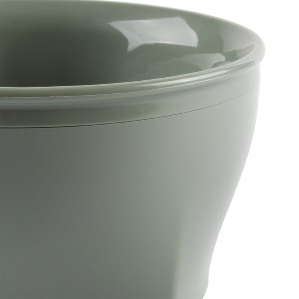 A close-up of a grey Cambro insulated bowl with a white lid.
