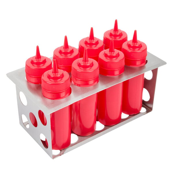 A stainless steel Eagle Group bottle holder filled with eight red bottles with red and white tops.