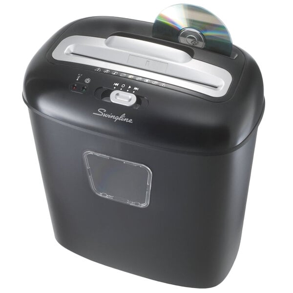A black and silver Swingline 1757393 EX10-05 Super Cross-Cut Shredder with a CD in it.