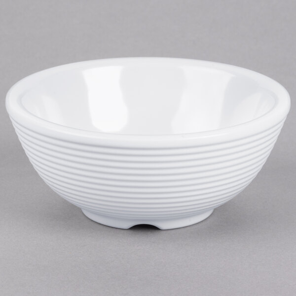 A white Tablecraft melamine ramekin on a gray surface.