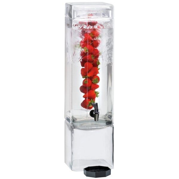 a water dispenser with a red fruit in it