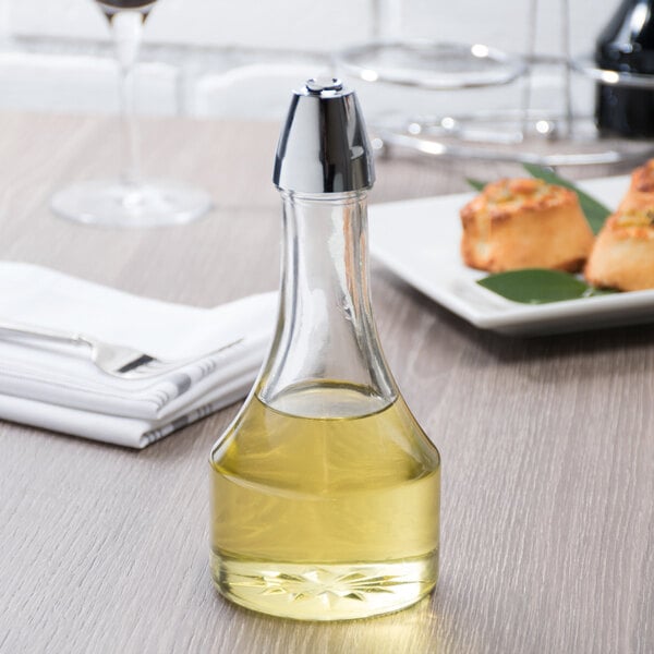 A Tablecraft oil cruet on a table.