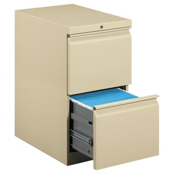 A HON putty filing cabinet with a drawer open.