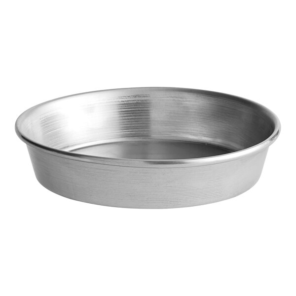 An American Metalcraft heavy weight aluminum pizza pan with a round bottom.