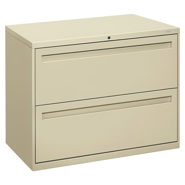 A tan file cabinet with two drawers.