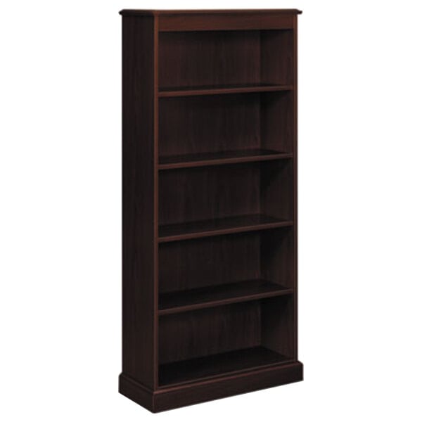 A dark wood bookcase with shelves.