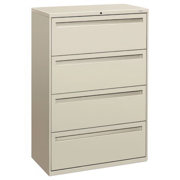 A light gray HON lateral filing cabinet with four drawers.