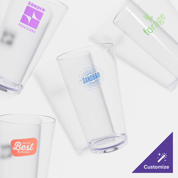 A group of clear plastic GET Revo Stackable Mixing glasses.