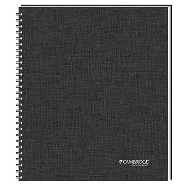 A close-up of a black Cambridge 1 subject linen covered spiral notebook.