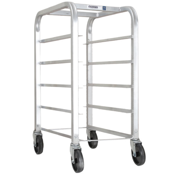 A silver metal Channel bottom load platter rack with 5 shelves on four wheels.