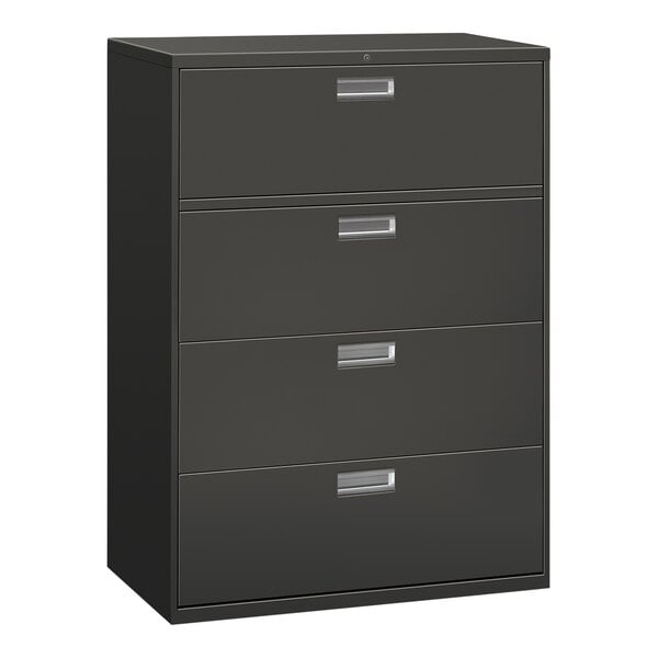 A charcoal HON Brigade four-drawer lateral filing cabinet with silver handles.