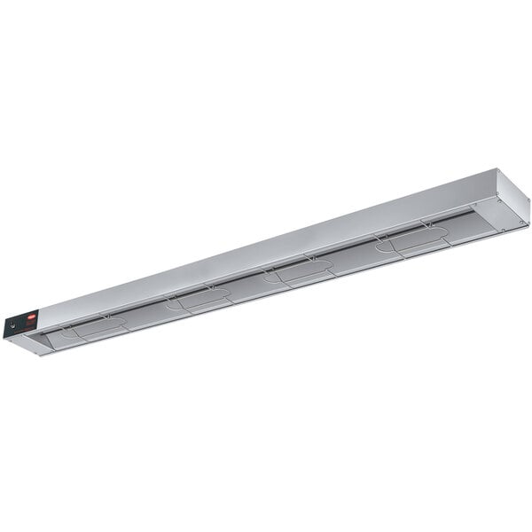 A long rectangular aluminum strip heater with toggle controls.