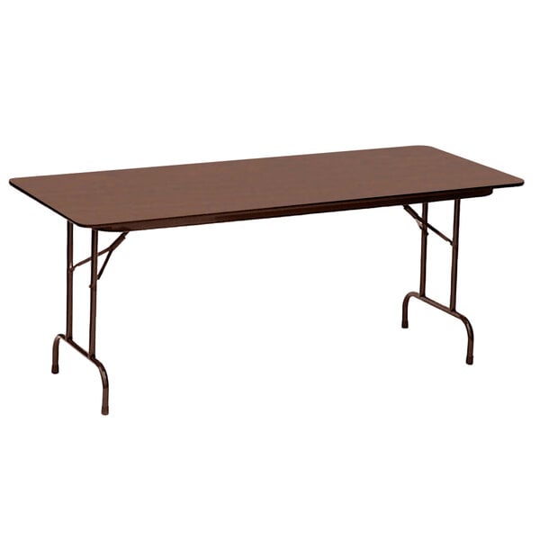 A brown rectangular Correll folding table with a metal frame.