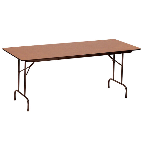 A brown rectangular Correll folding table with metal legs.