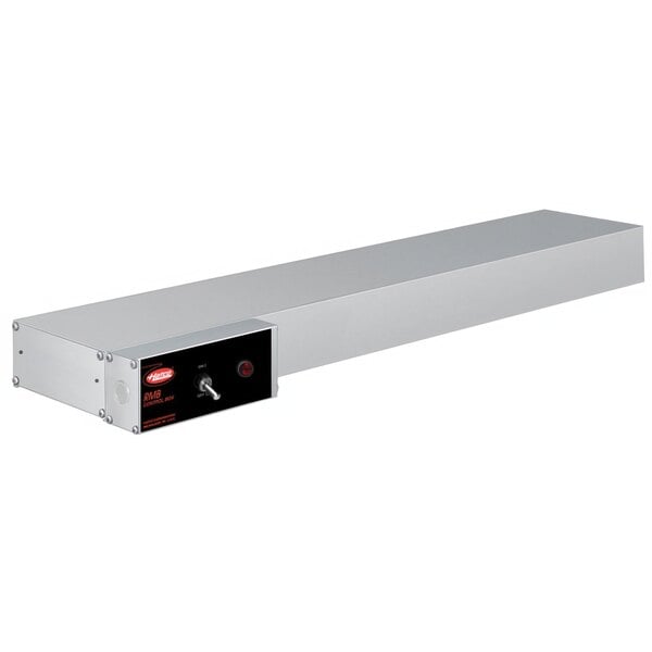 A long rectangular metal shelf with attached black and red toggle controls.