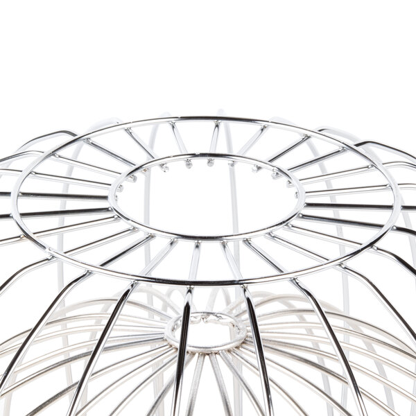 A Clipper Mill chrome plated iron wire basket with a circular design.