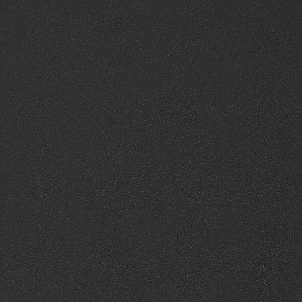 A black surface with small white specks.