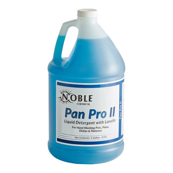 A blue plastic jug of Noble Pan Pro II detergent with a white label on a counter.
