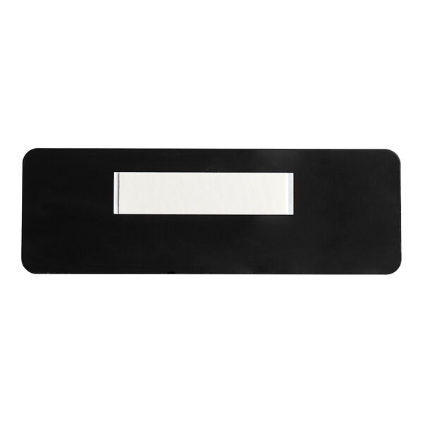 A black and white rectangular sign with black border and white writing that says "No Fumar / No Smoking"